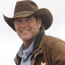 He looks like a man of America, but Robert Taylor is a man of Oz.