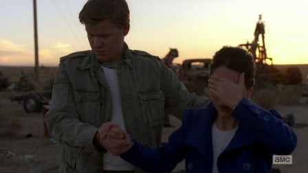 What a romantic, covering her eyes so she doesn't have to see all the people he and his Nazi uncle just killed!