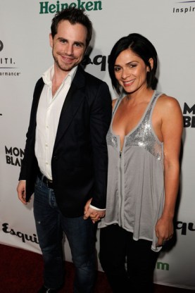 His facial hair is questionable, but she sure is pretty!